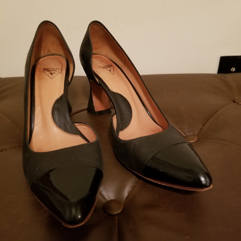 Black fluevog Desmond pumps with patent toe